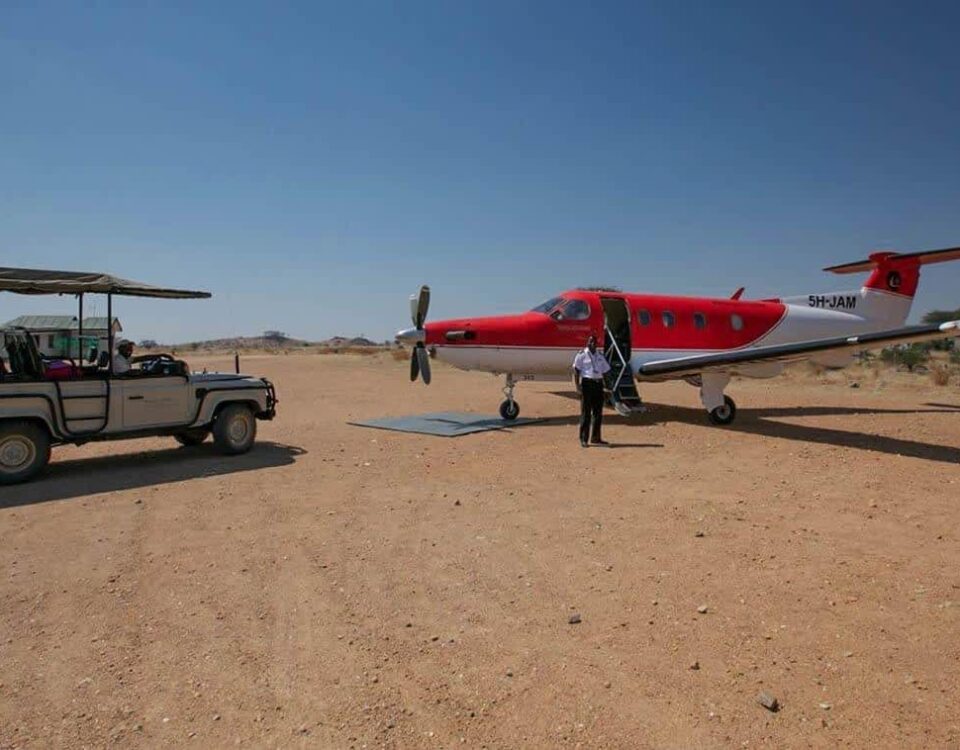 Are International Flights Between Kigali and Kilimanjaro/Seronera Included in Standard Luxury Packages?