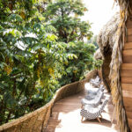 What Specific Views Can Guests Expect from Their Private Decks at Bisate Lodge?
