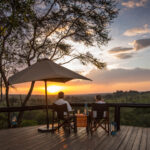 What Type of Accommodation is Best for Travelers Seeking Luxury Migration Safaris with Front-Row River Crossing Views?