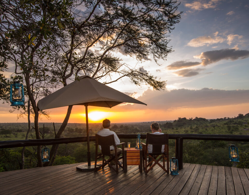 What Type of Accommodation is Best for Travelers Seeking Luxury Migration Safaris with Front-Row River Crossing Views?