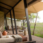 What Old-World Design Elements Define the Aesthetic of Singita Sasakwa Lodge?