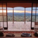 What Are the Advantages of the Expansive Glass-Fronted Tents at Loisaba Lodo Springs?