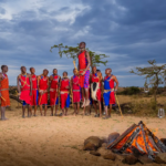 What authentic interaction opportunities exist with the Maasai communities near these lodges?