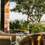 Are Private Safari Vehicles Provided Automatically for Guests Staying at Singita Sasakwa Lodge?