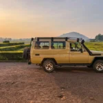 How does flying between camps eliminate the logistical challenges of East Africa’s Dirt Roads?